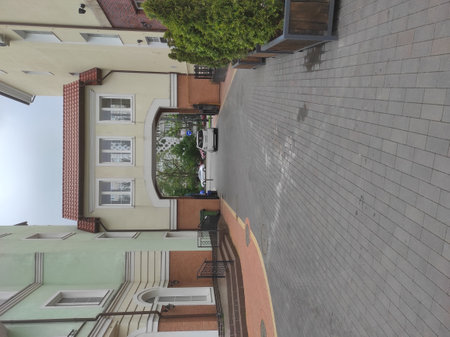 Modern and lovely homes with nature all around. A sunny summer day. Modern and old houses in Russia, Kaliningrad region, Svetlogorsk. Beautiful fences (fences). Architecture 2021, peaceful buildings.の写真素材