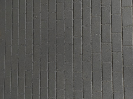 The street path is made of gray brick. Gray brick background. Clinker tiles.の写真素材
