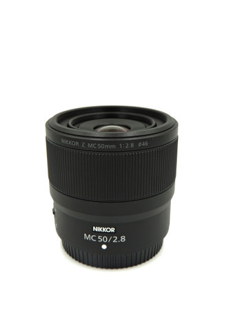 New Macro Lens Nikon Z 50mm f 2.8 MC Niko Z Lens. New in 2021, for the Z series of Nikon mirrorless mirrors. White background, macro.のeditorial素材
