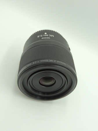 New Macro Lens Nikon Z 50mm f 2.8 MC Niko Z Lens. New in 2021, for the Z series of Nikon mirrorless mirrors. White background, macro.のeditorial素材