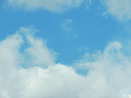 Blue sky with clouds over Russia. Summer skies. Russian sky with clouds. Gray-white and blue colors. Eco Sky in 2021. A sunny day.の写真素材