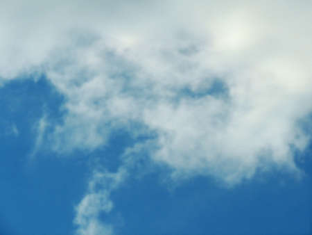 Blue sky with clouds over Russia. Summer skies. Russian sky with clouds. Gray-white and blue colors. Eco Sky in 2021. A sunny day.の写真素材