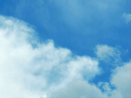 Blue sky with clouds over Russia. Summer skies. Russian sky with clouds. Gray-white and blue colors. Eco Sky in 2021. A sunny day.の写真素材