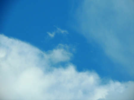 Blue sky with clouds over Russia. Summer skies. Russian sky with clouds. Gray-white and blue colors. Eco Sky in 2021. A sunny day.の写真素材