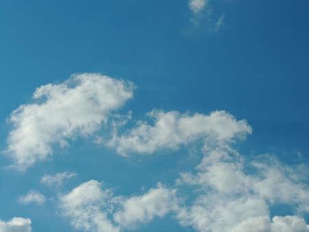 Blue sky with clouds over Russia. Summer skies. Russian sky with clouds. Gray-white and blue colors. Eco Sky in 2021. A sunny day.の写真素材