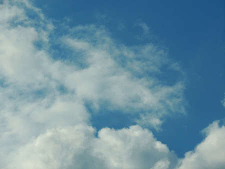 Blue sky with clouds over Russia. Summer skies. Russian sky with clouds. Gray-white and blue colors. Eco Sky in 2021. A sunny day.の写真素材