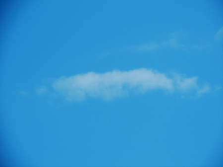 Blue sky with clouds over Russia. Summer skies. Russian sky with clouds. Gray-white and blue colors. Eco Sky in 2021. A sunny day.の写真素材