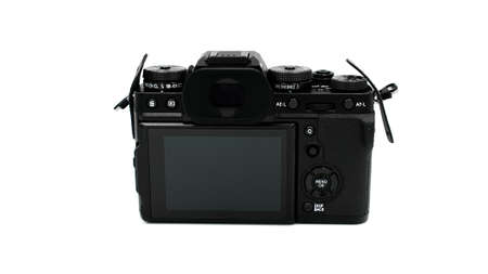 The Fujifilm X-T3 body mirrorless camera is black on a white background.のeditorial素材
