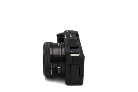 Mirrorless camera for video bloggers. Top blogger camera Sony Alpha ZV-E 10 kit 16-50mm black. On a white background.のeditorial素材
