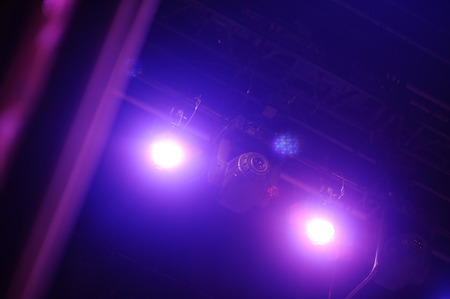 blue rays from the concert spotlights