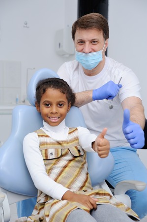 baby and childrens dentist patient smiling at the cameraの写真素材