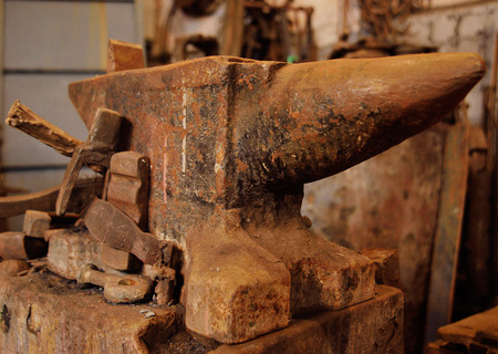a huge anvil close-up on the background of a forgeの写真素材