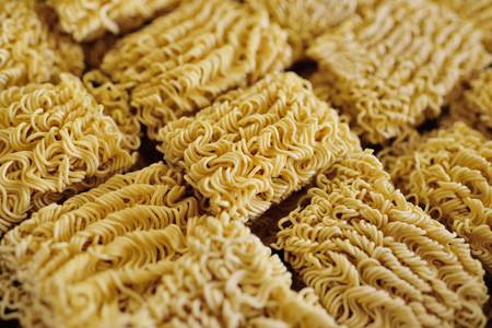 instant noodles - beautiful background, texture, close-up. Fast food