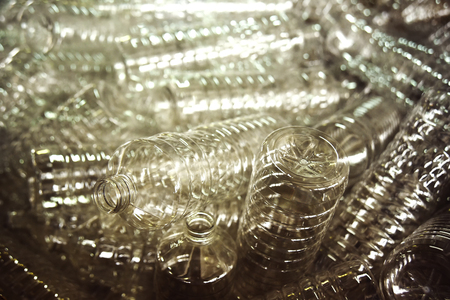 conveyor line for the production of plastic bottles close-upの写真素材