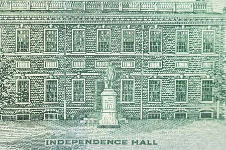 Independence Hall is super close-up on a hundred US dollars banknote of a new sample.