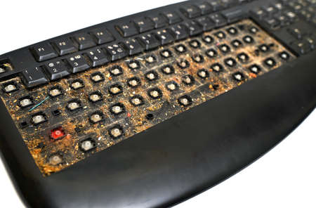very dirty black disassembled keyboard close-up