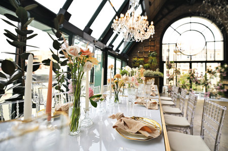 beautiful elegant decor of flowers and elegant serving on the wedding table.の写真素材