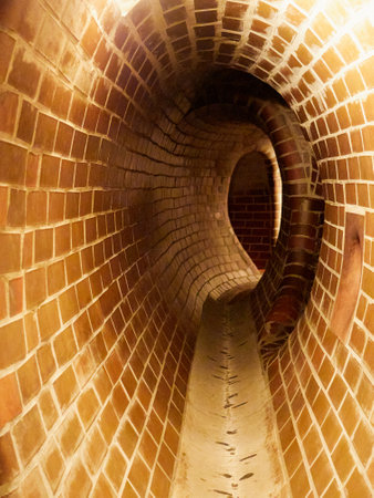Tunnel in the form of a spiral in the interior of the buildingの写真素材
