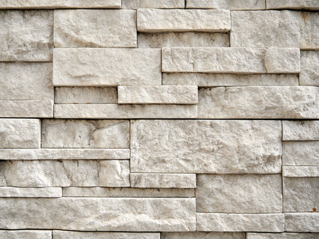 Background of stone wall texture. Stone wall background for design and decoration.の写真素材