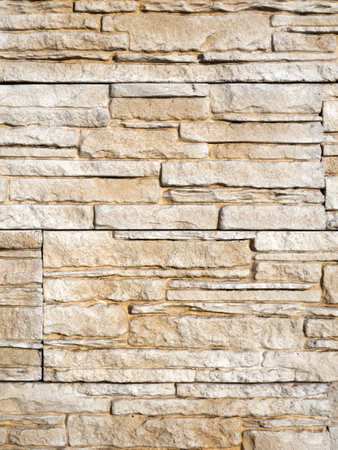 Background of stone wall texture. Stone wall background for design and decoration.の写真素材