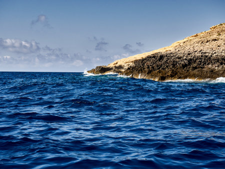 Photo with a beautiful view of the rocky Mediterranean coastline in Maltaの写真素材