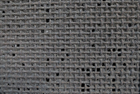 Dirty organic old burlap fabric in grid texture backgroundの写真素材