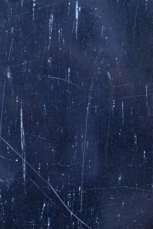 Blue concrete painted wall with white paint splatters. Artistic grunge backdropの写真素材