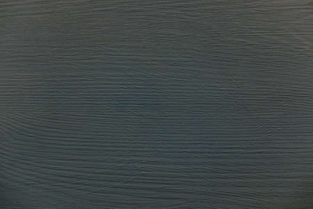 Painted wood board with streaks for textured pattern backdropの写真素材