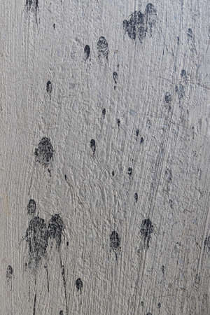 Black and white plaster and paint splotches textured backgroundの写真素材