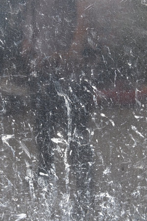 Abstract material pattern background with scratches and paint stainsの写真素材