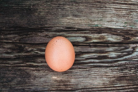 egg on wooden backgroundの写真素材