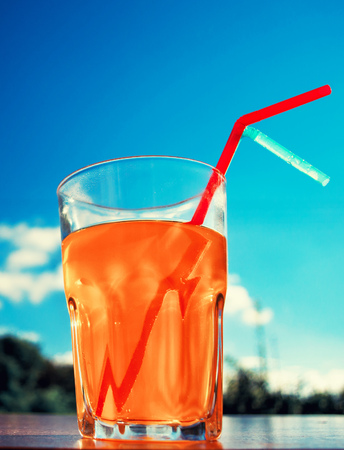 orange juice against the skyの写真素材