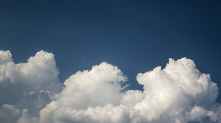 blue sky background with tiny clouds. Beautiful clouds