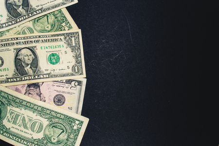 Dollars on a black background. Finance. Vintage effectの写真素材