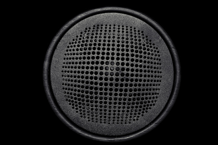 Portable musical column against a dark background. Top view.の写真素材