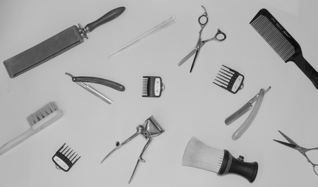 Vintage black and white photo with the tools of a hairdresser. In the photo there is fine grain.の写真素材