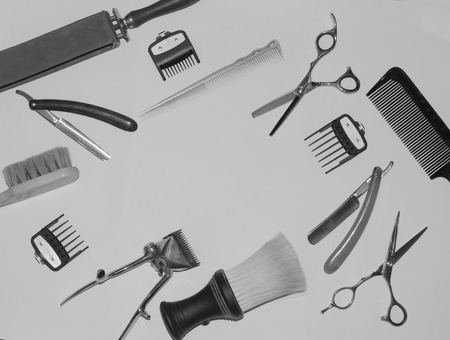 Vintage black and white photo with the tools of a hairdresser. In the photo there is fine grain.の写真素材