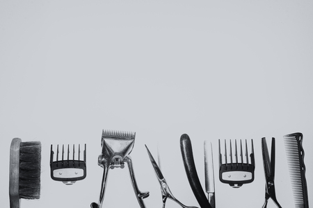 Vintage black and white photo with the tools of a hairdresser. In the photo there is fine grain.の写真素材