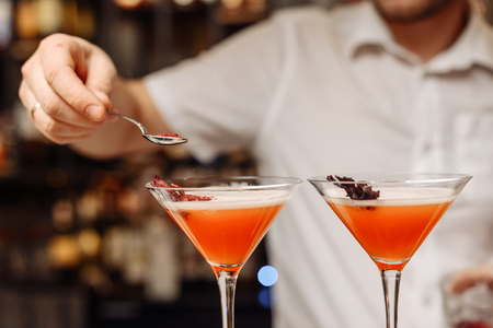 Cocktail Preparation. The barman is preparing a drink.の写真素材