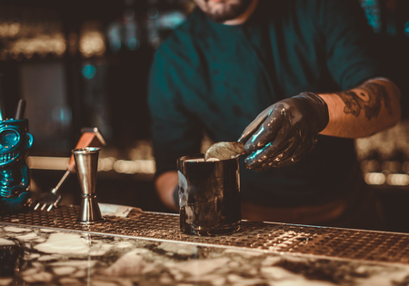 Cocktail Preparation. The barman is preparing a drink.の写真素材