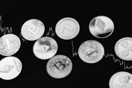 Bitcoin on a black and white background. Cryptocurrency trading. Financial dependence on cryptocurrency.の写真素材