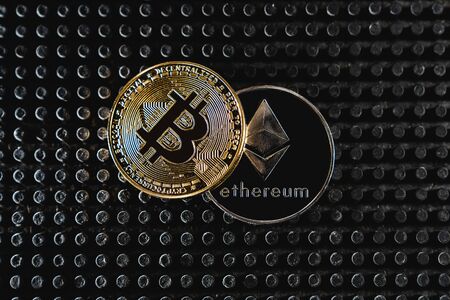 Bitcoin trading. Cryptocurrency coin on dark background.の写真素材