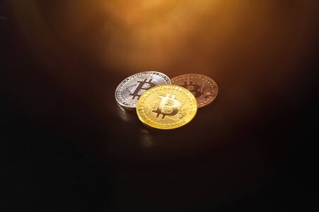 Bitcoin on a dark background. Economic crisis. Cryptocurrency trading.の写真素材