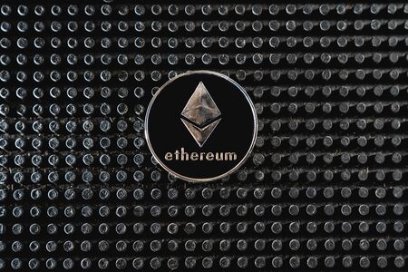 Bitcoin trading. Cryptocurrency coin on dark background.の写真素材