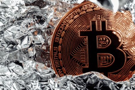 Bitcoin on silver background. Halving cryptocurrency. The crisis in the economy.の写真素材