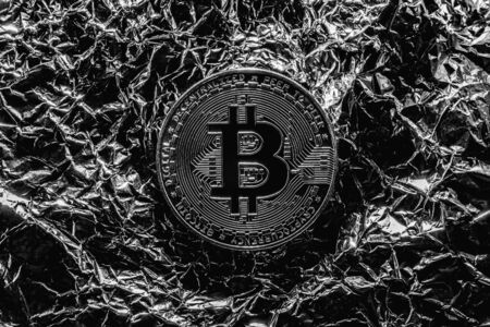 Bitcoin on silver background. Halving cryptocurrency. The crisis in the economy.の写真素材
