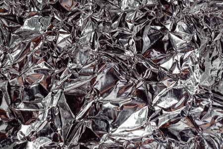 Foil texture. Silver texture close-up photo. Metal backgroundの写真素材