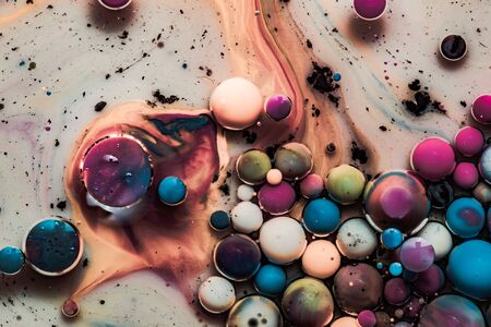 Colored abstract background.Ink Bubbles In Water. Abstract colorful paint. Macro photoの写真素材