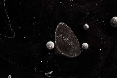 Contrast macro abstraction of bubbles in water. Space macro photo.の写真素材