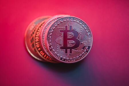 Stack of bitcoins on bright background. Economic crisis in the stock market.の写真素材
